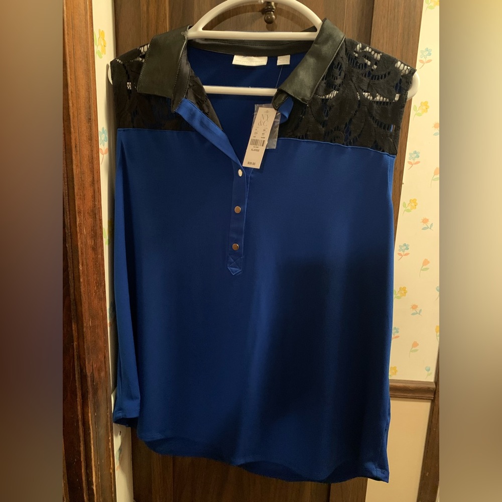 Sleeveless NY&Co blouse, blue with black collar.